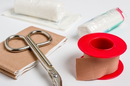Wound dressing materials for pet first aid kit, surgical scissors, tape, gauze