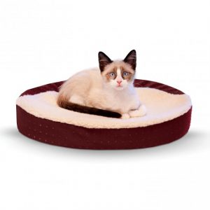 Tops on our Gift Guide for Senior Pets is this memory foam cuddle bed.